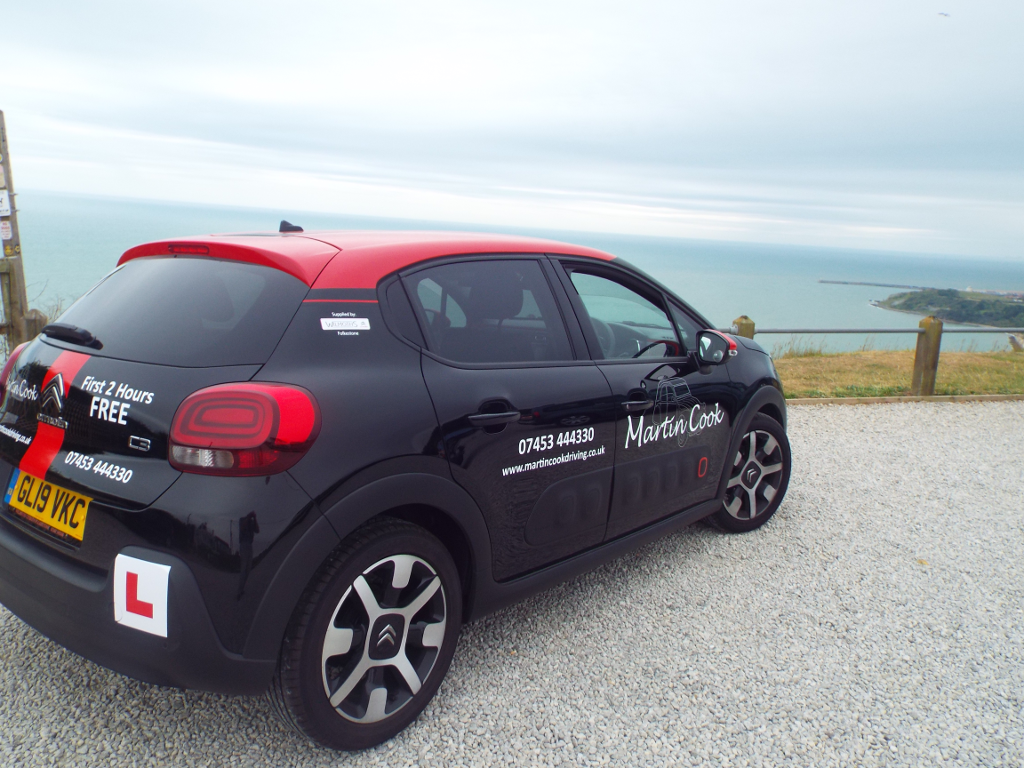 Full side shot of the instructor's car